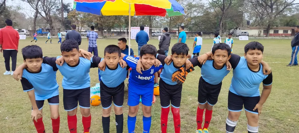 Young football teammates together on the field